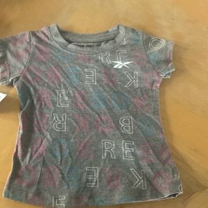 Jumpsuit for toddler. It’s pink and blue brand new and hasn’t been worn.